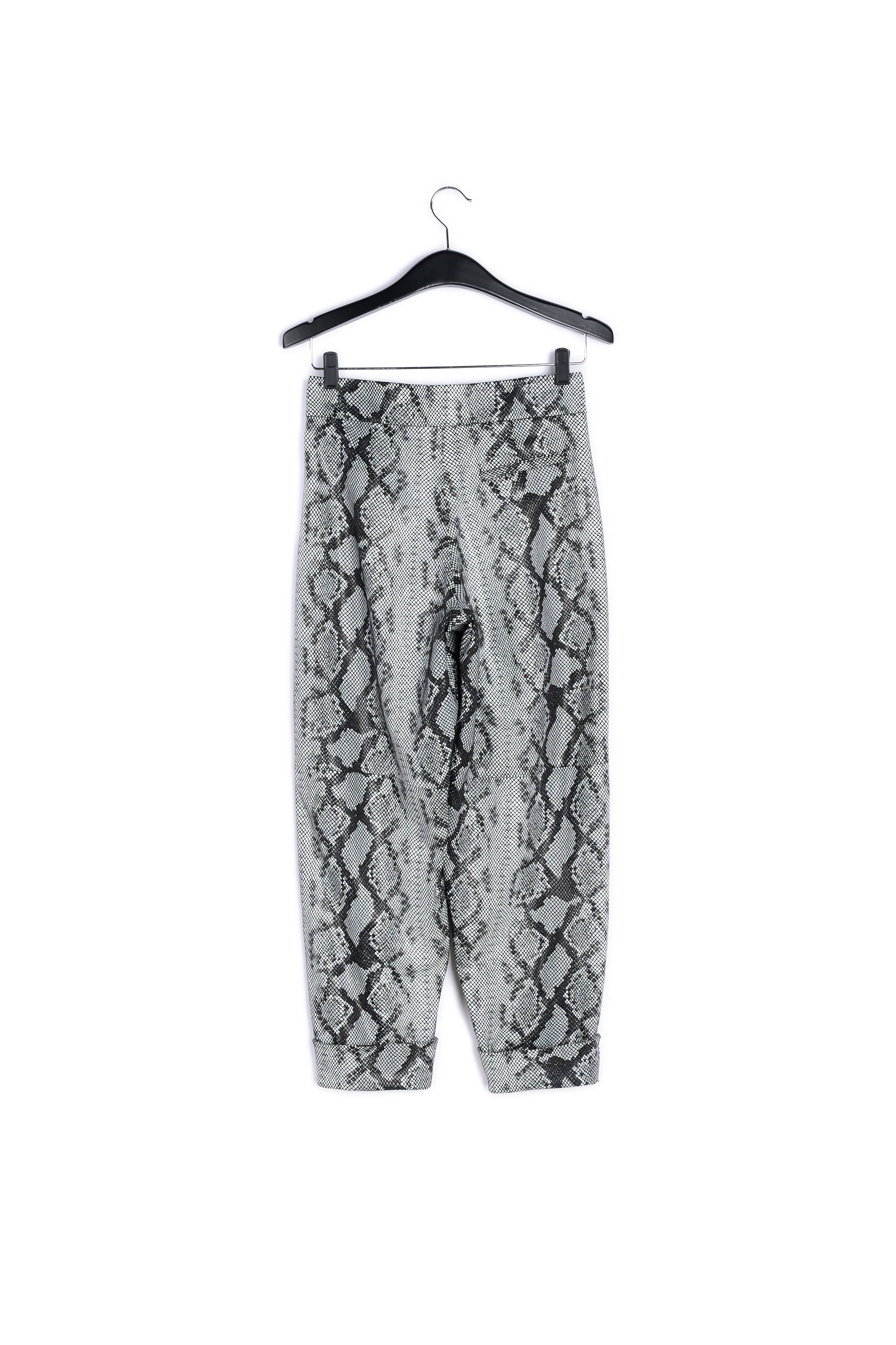 Black and white faux snake skin structured trousers
