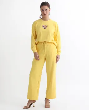 Rareism Articale Women Pazoo T Yellow Cotton Blend Fabric Drawstring Closure Flared Fit Plain Ankle Length Track Pant